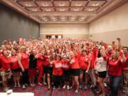 Members of the Oregon Federation of Nurses & Health Professionals celebrate before the ratification of a three-year collective bargaining agreement with Kaiser Permanente.