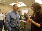 After accepting the Pacific Northwest Waterways Association’s Legislator of the Year award, Rep. Jaime Herrera Beutler talks with Port of Kalama Commissioner Troy Stariha.