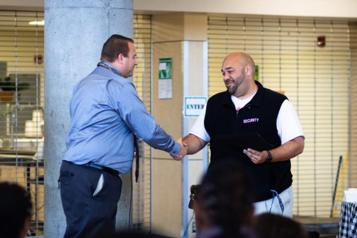 East Vancouver: Evergreen Public Schools Manager of School Safety and Security Shane Gardner, left, and Jamal McKenzie, Union High School’s campus security officer. McKenzie was named Security Officer of the Year by the Washington School Safety Organization.