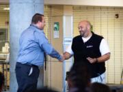 East Vancouver: Evergreen Public Schools Manager of School Safety and Security Shane Gardner, left, and Jamal McKenzie, Union High School’s campus security officer. McKenzie was named Security Officer of the Year by the Washington School Safety Organization.