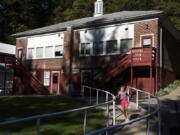 Kindergartner Piper Caseday runs down the ramp for recess at Green Mountain School.