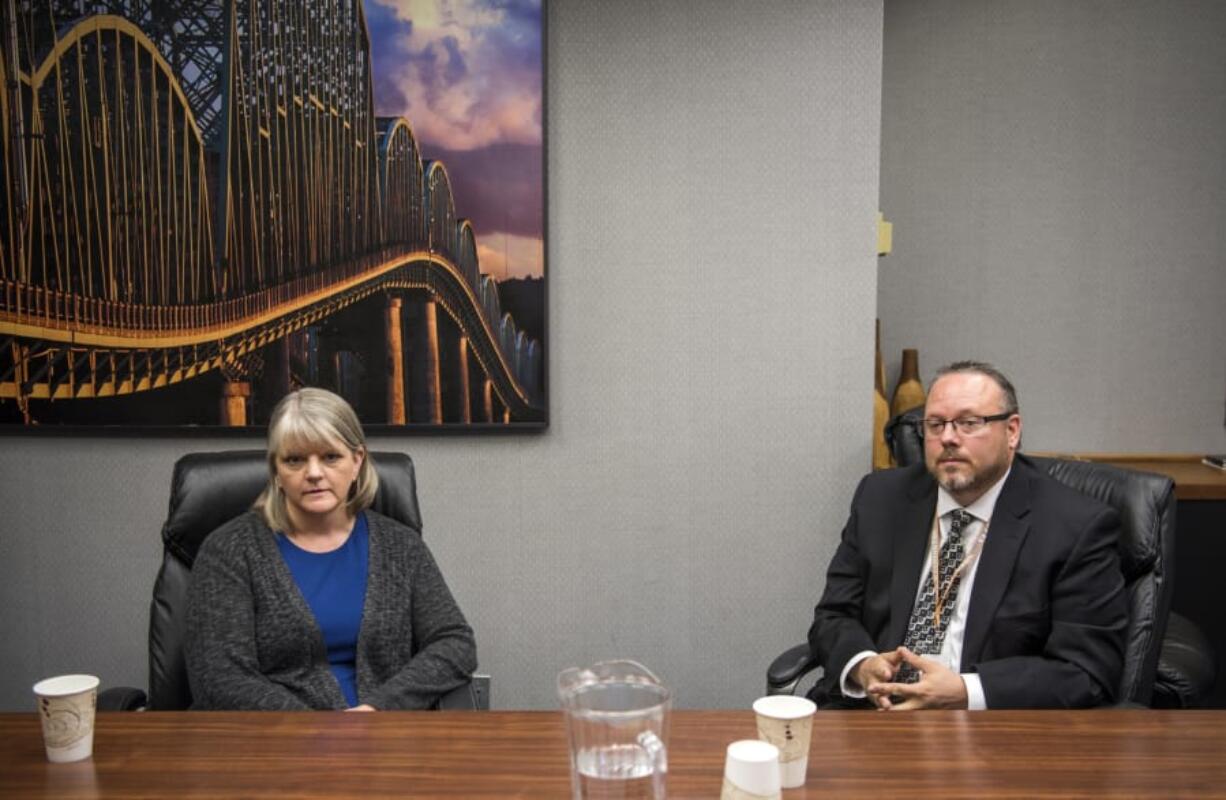 Democratic challenger Barbara Melton, left, and Republican County Clerk Scott Weber meet with The Columbian’s Editorial Board on Oct. 16.