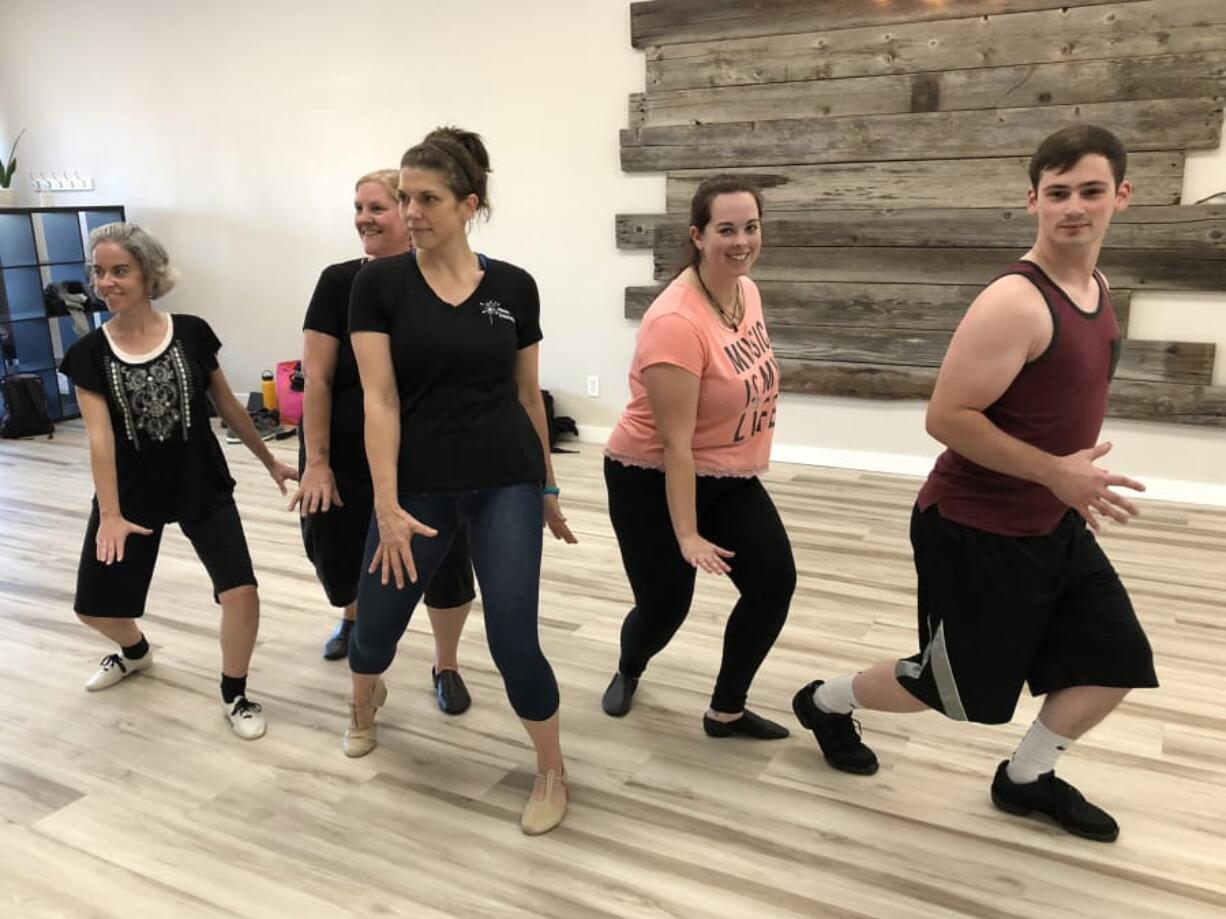 Rehearsing a song and dance for Pacific Stageworks’ upcoming Dark Times Masquerade Gala are, from left: Jeanne Reed, Pacific Stageworks president Heather Blackthorn, choreographer Demarie Day, Katrina Cannon and Robert Altieri.