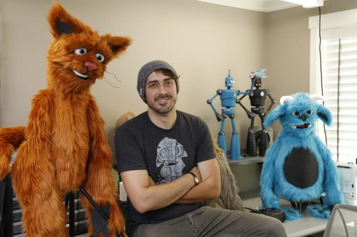 Kevin Gorby of Luna’s Puppets in his workshop on Monday. The Battle Ground business worked with a London ad agency to build an animatronic teddy bear named Toxic Toby that coughs when it detects high levels of pollution.