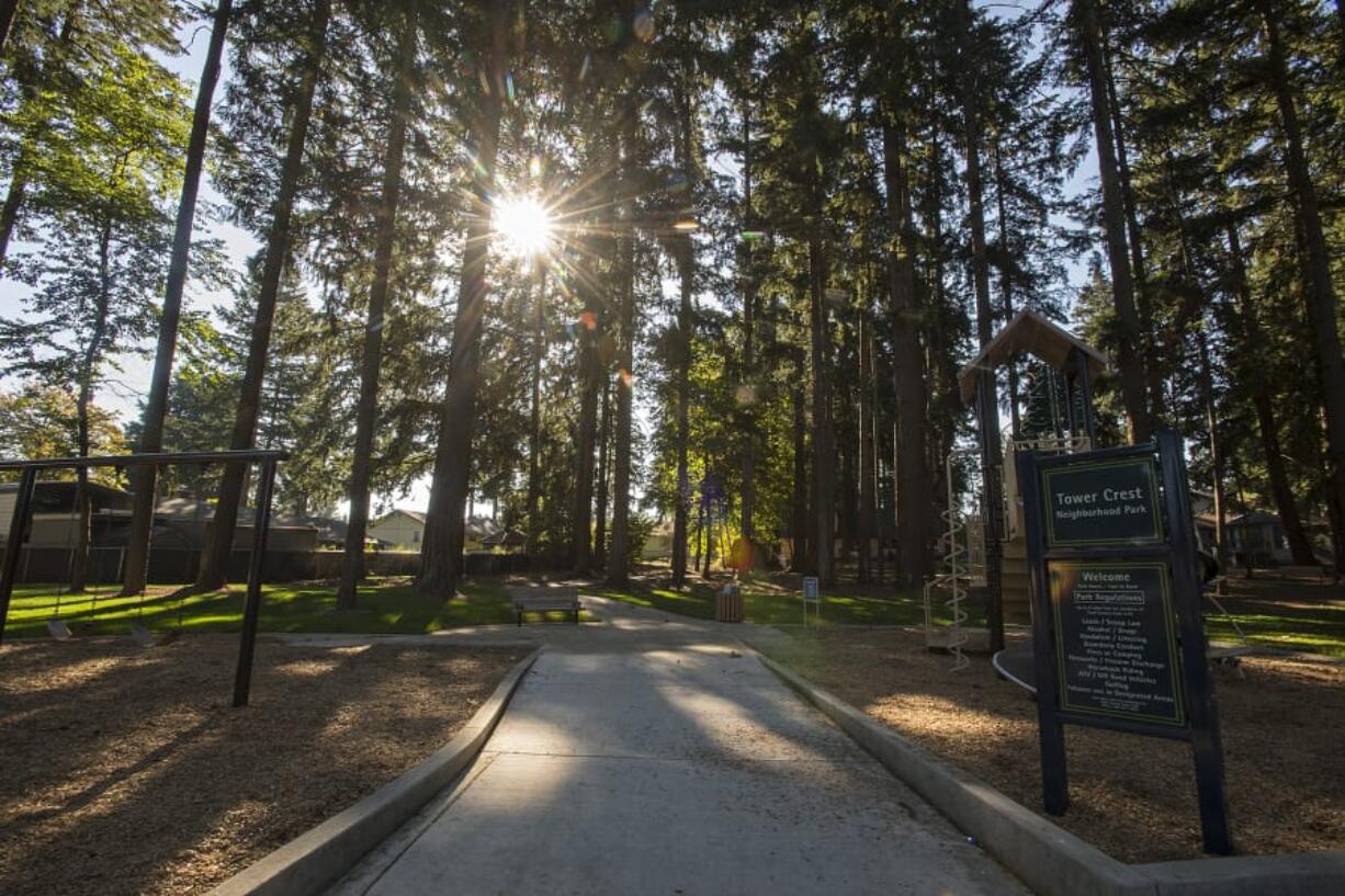 Sunlight illuminates a walking path at Tower Crest Neighborhood Park earlier this week. Park Impact Fees paid for parts of the recently completed park, but the fees currently can’t be used for trail development.