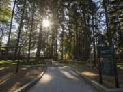 Sunlight illuminates a walking path at Tower Crest Neighborhood Park earlier this week. Park Impact Fees paid for parts of the recently completed park, but the fees currently can’t be used for trail development.