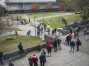 We chose to use this photo of Wednesday’s Patriot Prayer rally at WSU Vancouver because it shows the number of reporters who attended vs. the number of students and others who attended.