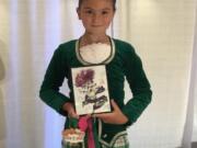 Burnt Bridge Creek: Burnt Bridge Creek fourth-grader Stella Bluhm, 9, finished fourth runner-up in the 9-and-younger division at the United States Inter-Regional nationals for Scottish Highland dancing.