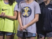 A Hockinson player wears a shirt supporting Wyatt Draper before a match against Woodland at Hockinson High School.