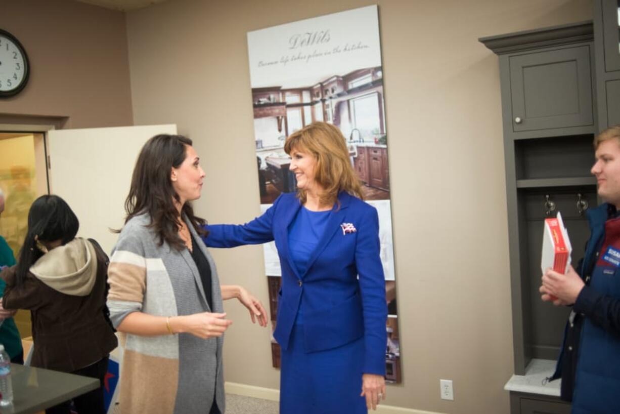 U.S. Rep. Jaime Herrera Beutler, speaks with U.S. Senate candidate Susan Hutchison. Hutchison told local Republicans that the two would be a team in Congress.