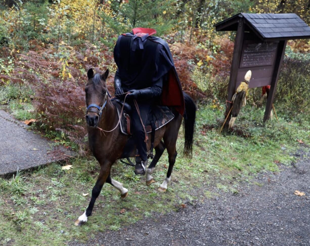 The Headless Horseman follows the Chelatchie Prairie Railroad’s Halloween steam train Sunday afternoon as it winds along its short route through north Clark County.