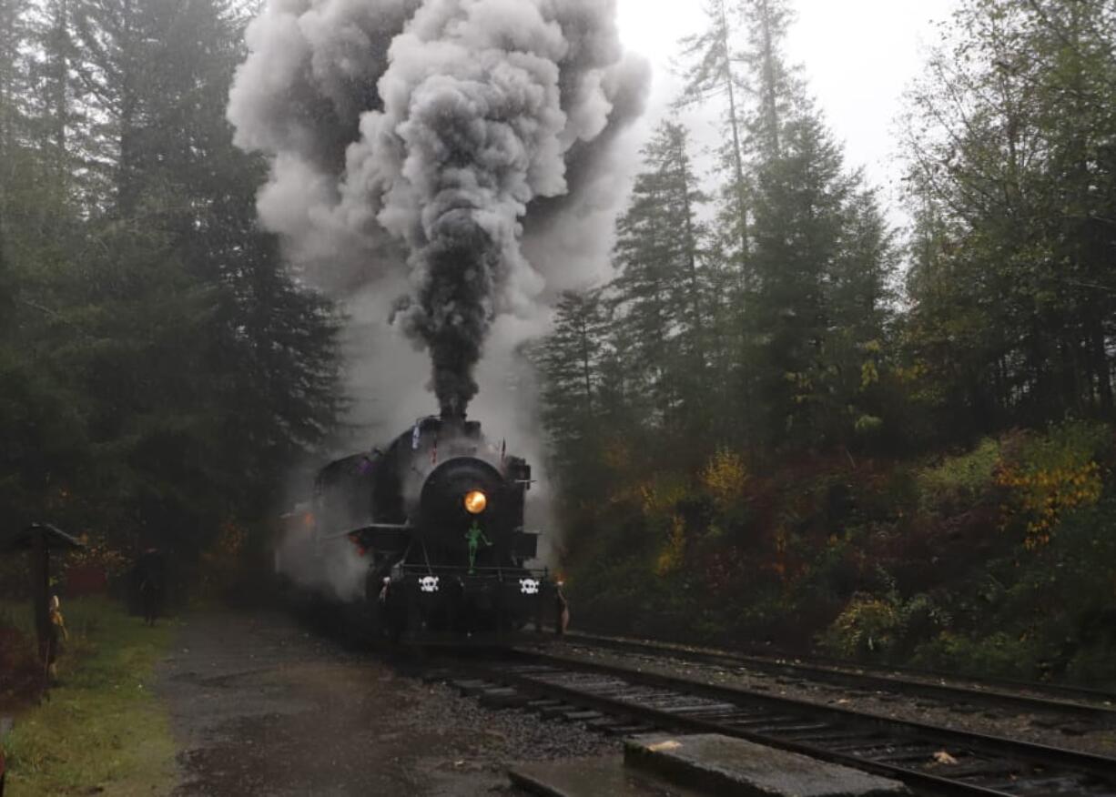 The Chelatchie Prairie Railroad organization dressed its steam train, used for weekend rides through the area, in Halloween decor over the weekend, and a Headless Horseman trotted alongside as part of the group’s spooky seasonal event.