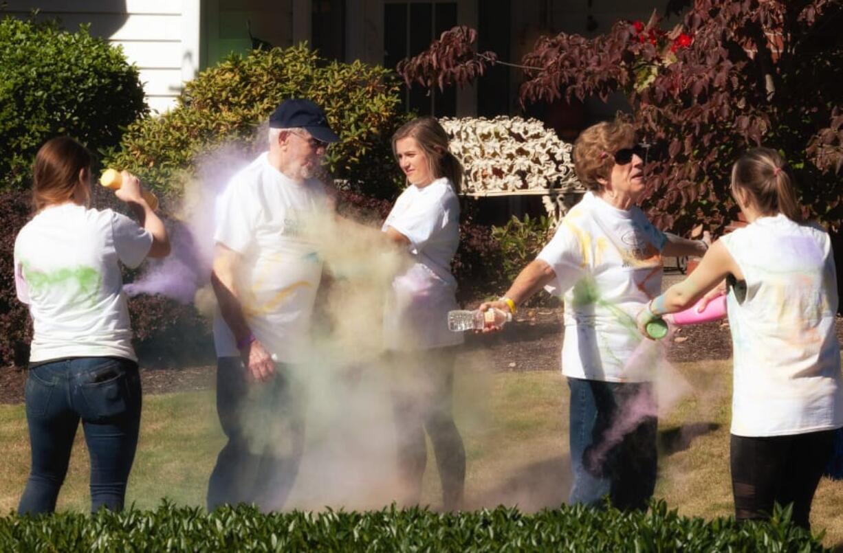 Fairway-164th: Roughly 100 people participated in the color walk during Touchmark at Fairway Village’s Active Aging Week celebration. The event, where guests walked through colored cornstarch, raised more than $700 for the Boys & Girls Clubs of Southwest Washington.