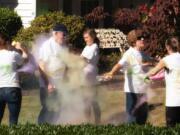 Fairway-164th: Roughly 100 people participated in the color walk during Touchmark at Fairway Village’s Active Aging Week celebration. The event, where guests walked through colored cornstarch, raised more than $700 for the Boys & Girls Clubs of Southwest Washington.