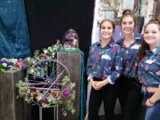 Portland: Evergreen High School students, from left, Autumn Kimble, Shelbeigh Weaver and Brianna Schrantz won first place in the second Frank Adams Annual Floral Chopped Competition.