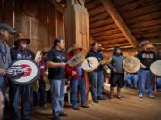 Chinook Indian Nation Vice Chairman Sam Robinson, second from right, will sing, drum and talk about the importance of music during a Thursday night presentation at the Clark County Historical Museum.