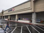 A customer leaves the Safeway at 13719 S.E. Mill Plain Blvd. on Thursday afternoon.