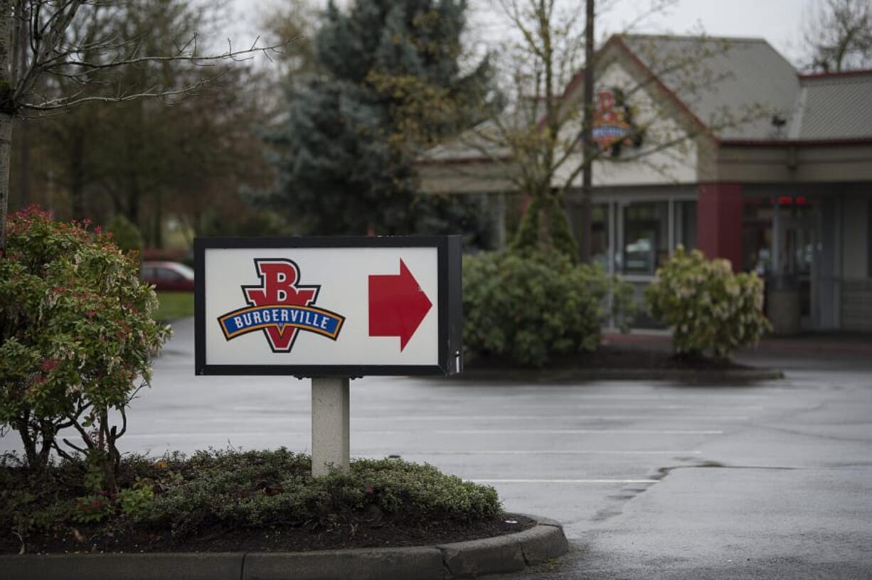 A sign greets customers at the Burgerville restaurant along Southeast McGillivray Boulevard on Friday morning, April 6, 2018.