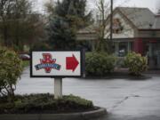 A sign greets customers at the Burgerville restaurant along Southeast McGillivray Boulevard on Friday morning, April 6, 2018.