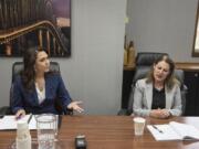 U.S. Rep. Jaime Herrera Beutler, R-Battle Ground, left, and Democratic candidate Carolyn Long speak to The Columbian's Editorial Board in August .