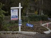 For sale signs are seen along Northwest 108th Circle in Hazel Dell in November 2016.