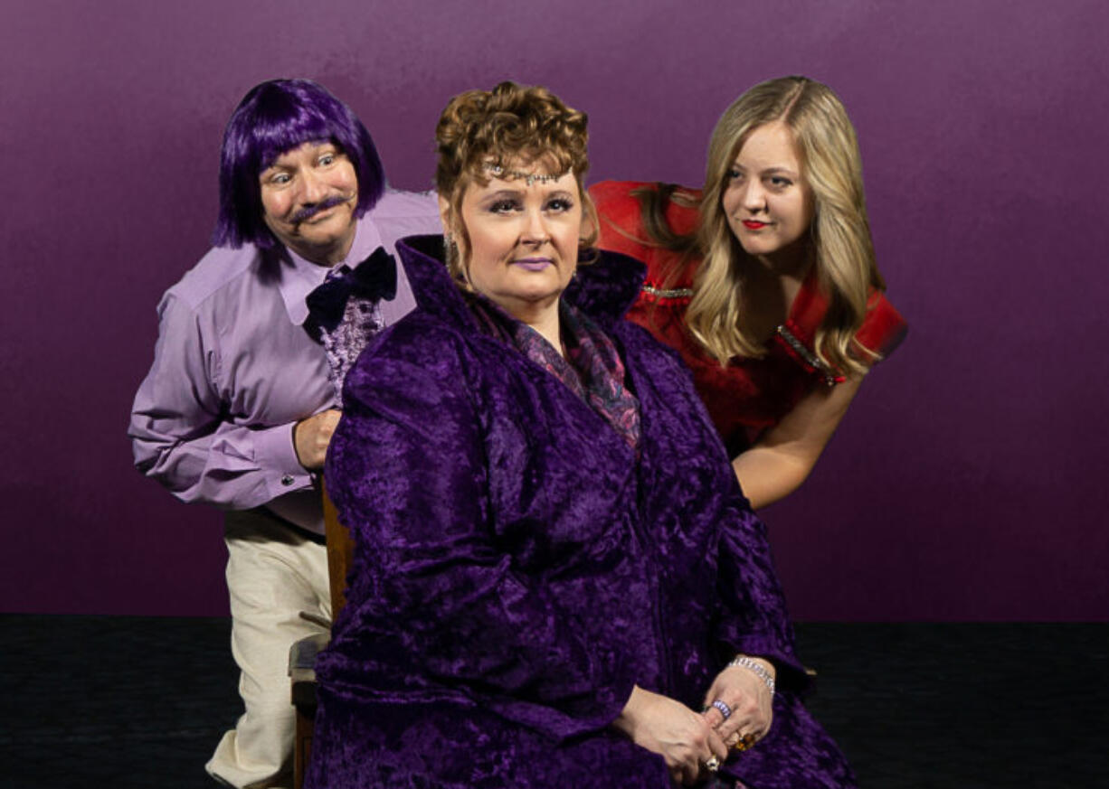 The easily excitable Queen Violet (Kristen Noel, center) tries staying cool while besieged by her slithering manservant, Panini (Tony Provenzola) and the way-too-perfect Princess Scarlett Sonata (Honor Stevenson) in Magenta Theater’s revival of “Once Upon a Palace Purple.” (Stephanie Roberts/Fetching Photos)