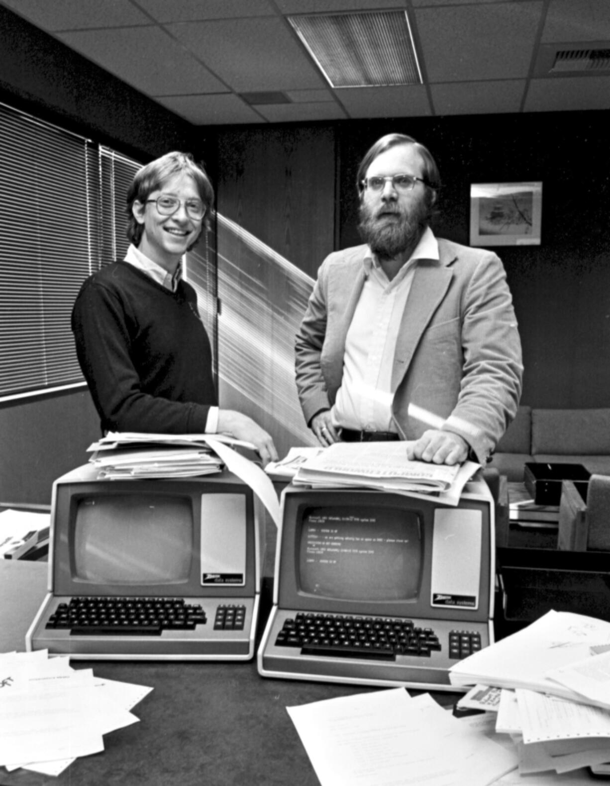 Bill Gates, left, and Paul Allen are shown in 1979 when they moved Microsoft to Bellevue. Allen died Monday of non-Hodgkin lymphoma at age 65.