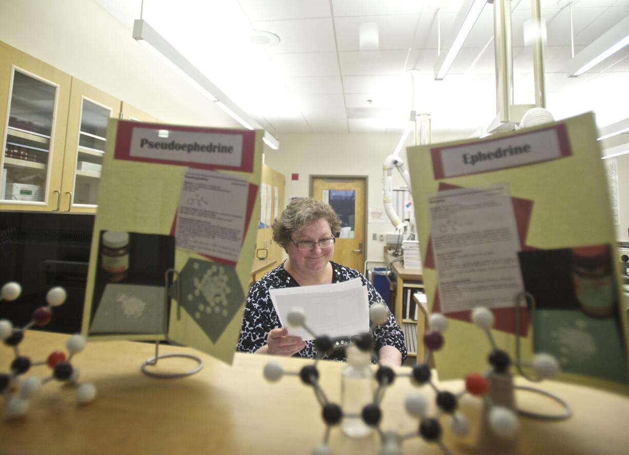 Scientist Sharon Herbelin works inside the Washington State Patrol Crime Lab in Vancouver in February 2014.