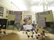 Scientist Sharon Herbelin works inside the Washington State Patrol Crime Lab in Vancouver in February 2014.