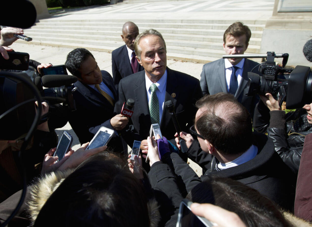 FILE - In this March 21, 2016, file photo, Rep. Chris Collins, R-N.Y., speaks with reporters as he leaves a closed-door meeting with Republican presidential candidate Donald Trump in Washington. Collins is running for re-election in New York's most conservative district.