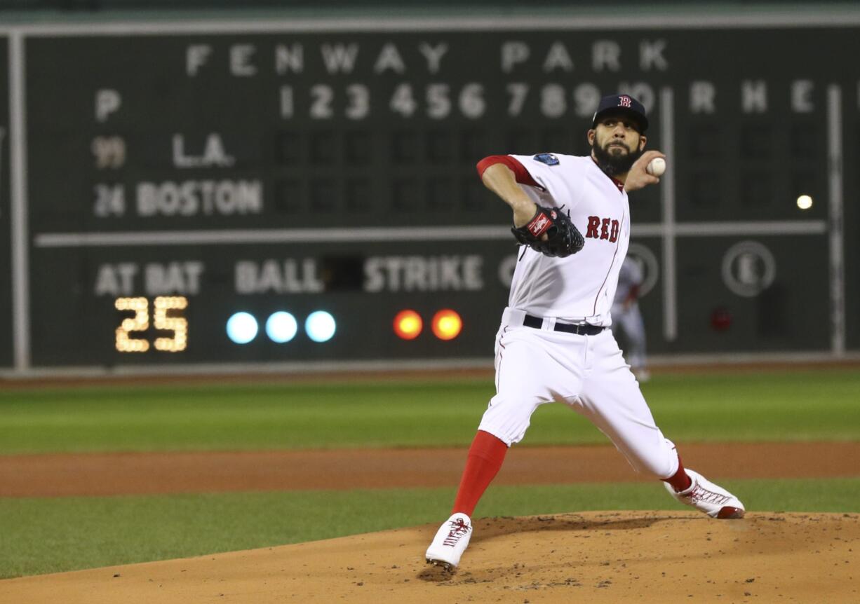 Boston Red Sox starting pitcher David Price throws during the first inning of Game 2 of the World Series baseball game against the Los Angeles Dodgers Wednesday, Oct. 24, 2018, in Boston.