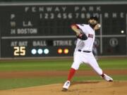 Boston Red Sox starting pitcher David Price throws during the first inning of Game 2 of the World Series baseball game against the Los Angeles Dodgers Wednesday, Oct. 24, 2018, in Boston.