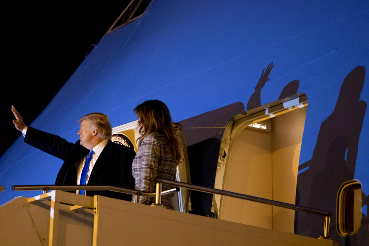 President Donald Trump and first lady Melania Trump board Air Force One at Pittsburgh International Airport in Coraopolis, Pa., Tuesday, Oct. 30, 2018, after visiting the Tree of Life Synagogue the sight of last Saturday's mass shooting.