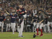 The Boston Red Sox celebrate after Game 5 of baseball’s World Series against the Los Angeles Dodgers on Sunday, Oct. 28, 2018, in Los Angeles. The Red Sox won 5-1 to win the series 4 game to 1. (AP Photo/Jae C.