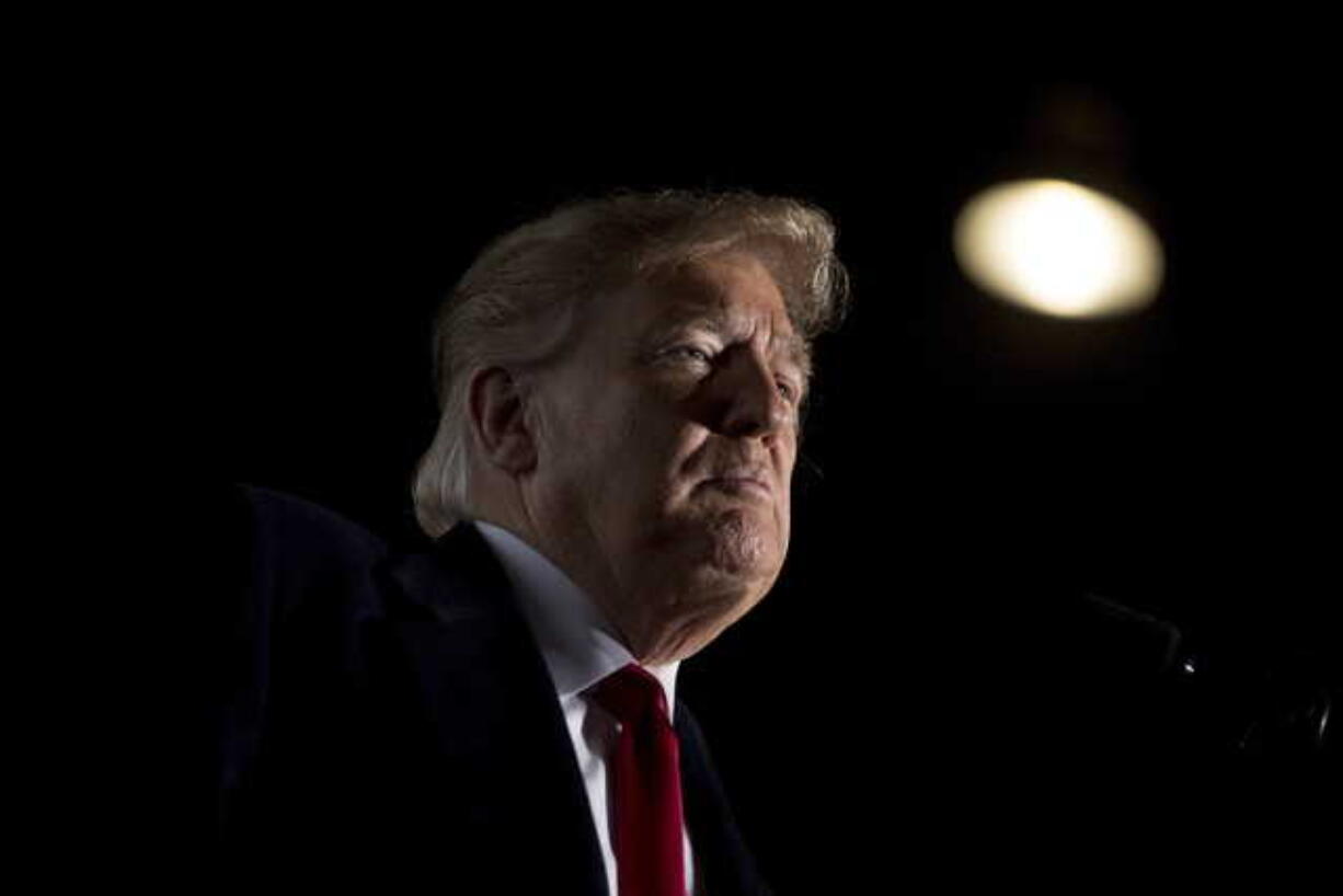 In this Oct. 27, 2018, file photo, President Donald Trump pauses while speaking at a rally at Southern Illinois Airport in Murphysboro, Ill. Trump says he wants to order the end of the constitutional right to citizenship for babies of non-citizens and unauthorized immigrants born in the United States. The president's comments to "Axios on HBO" come amid a renewed push for hardline immigration policies in the lead-up to the midterm elections.