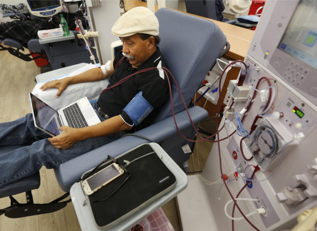 Adrian Perez undergoes dialysis at a DaVita Kidney Care clinic last month in Sacramento, Calif. A California ballot initiative would cap dialysis companies’ profits.