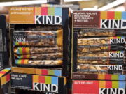 Kind snack bars on display at a supermarket in New York. The government’s definition of healthy came under scrutiny in late 2015, when the FDA warned Kind that its snack bars had too much fat to use the term. Kind pushed back, saying the fat came from nuts.