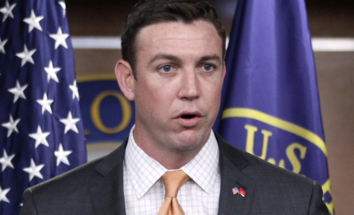 FILE - In this April 7, 2011, file photo, Rep. Duncan Hunter, R-Calif., speaks during a news conference on Capitol Hill in Washington. Hunter and his wife were charged by a federal grand jury in August with using more than $250,000 in campaign funds to finance family trips to Italy and Hawaii, golf outings, school tuition, theater tickets and fast-food purchases, then attempting to disguise the illegal spending in federal records. He’s depicted himself as a victim of a political witch hunt, but the charges have made the outcome in a once-safe Republican less predictable and emboldened his Democrat opponent, Ammar Campa-Najjar.