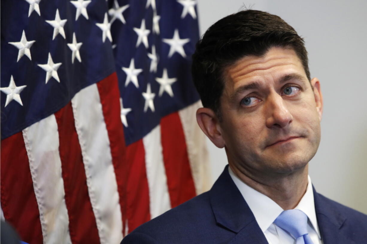 FILE - In this July 24, 2018 file photo, House Speaker Paul Ryan of Wis., attends a news conference following a GOP caucus meeting on Capitol Hill in Washington. As Ryan bows out of Congress, he leaves no obvious heir apparent. House Republicans are scrambling to salvage their majority but also confronting a potentially messy GOP leadership battle regardless of which party controls the chamber after the November election.