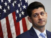 FILE - In this July 24, 2018 file photo, House Speaker Paul Ryan of Wis., attends a news conference following a GOP caucus meeting on Capitol Hill in Washington. As Ryan bows out of Congress, he leaves no obvious heir apparent. House Republicans are scrambling to salvage their majority but also confronting a potentially messy GOP leadership battle regardless of which party controls the chamber after the November election.