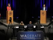 Sen. Maria Cantwell, D-Wash., right, takes part in a debate with her Republican challenger, Susan Hutchison, left, Monday, Oct. 8, 2018, at Pacific Lutheran University in Tacoma, Wash. (AP Photo/Ted S.