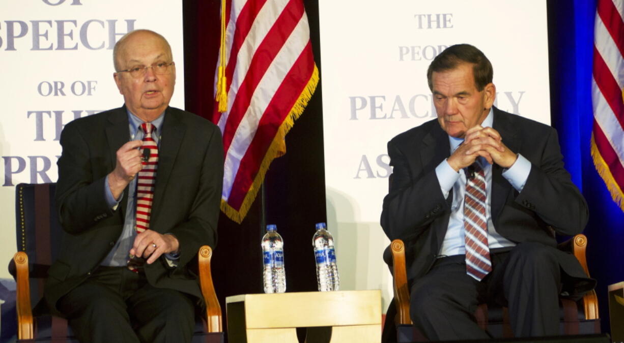 Gen. Michael Hayden, former head of CIA and the National Security Agency, left, speaks as former Homeland Security Secretary Tom Ridge, also former governor Pennsylvania, listens at the National First Amendment Conference in Pittsburgh on Monday. Journalists, scholars and government officials past and present have gathered in Pittsburgh to emphasize the First Amendment’s continuing importance in American society.