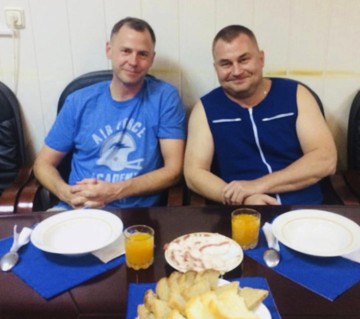 In this photo released by Roscosmos, NASA Astronaut Nick Hague, left, and Roscosmos cosmonaut Alexei Ovchinin pose for a photo in Baikonur, Kazakhstan on Thursday, Oct. 11, 2018, after an emergency landing following the failure of a Russian booster rocket carrying them to the International Space Station.