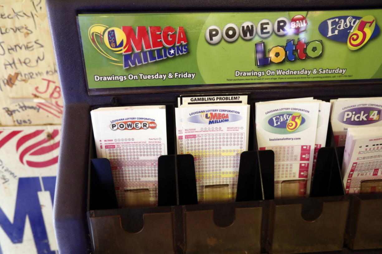 Lottery officials say two tickets have won the estimated $750 million Powerball jackpot. Rogelio V.