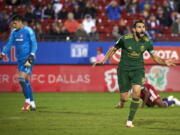 Portland Timbers midfielder Diego Valeri (8) celebrates after scoring a goal against FC Dallas during the second half of an MLS soccer playoff match in Frisco, Texas, Wednesday, Oct. 31, 2018.