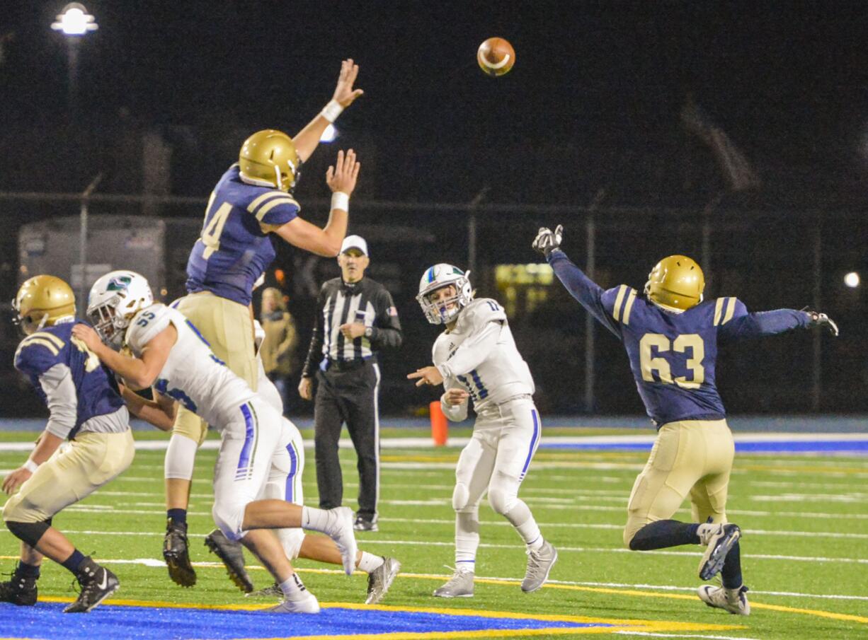 Garrett Moen throws a pass during Mountain View's 49-7 win over Kelso in Greater St. Helens 3A League football on Friday at Schroeder Field.