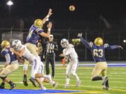 Garrett Moen throws a pass during Mountain View's 49-7 win over Kelso in Greater St. Helens 3A League football on Friday at Schroeder Field.