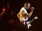 Tauren Wells performs during the Dove Awards on Tuesday in Nashville, Tenn.