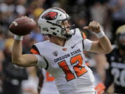 Oregon State quarterback Jack Colletto (12) looks to pass against Colorado during the first half of an NCAA football game, Saturday, Oct. 27, 2018, in Boulder, Colo.