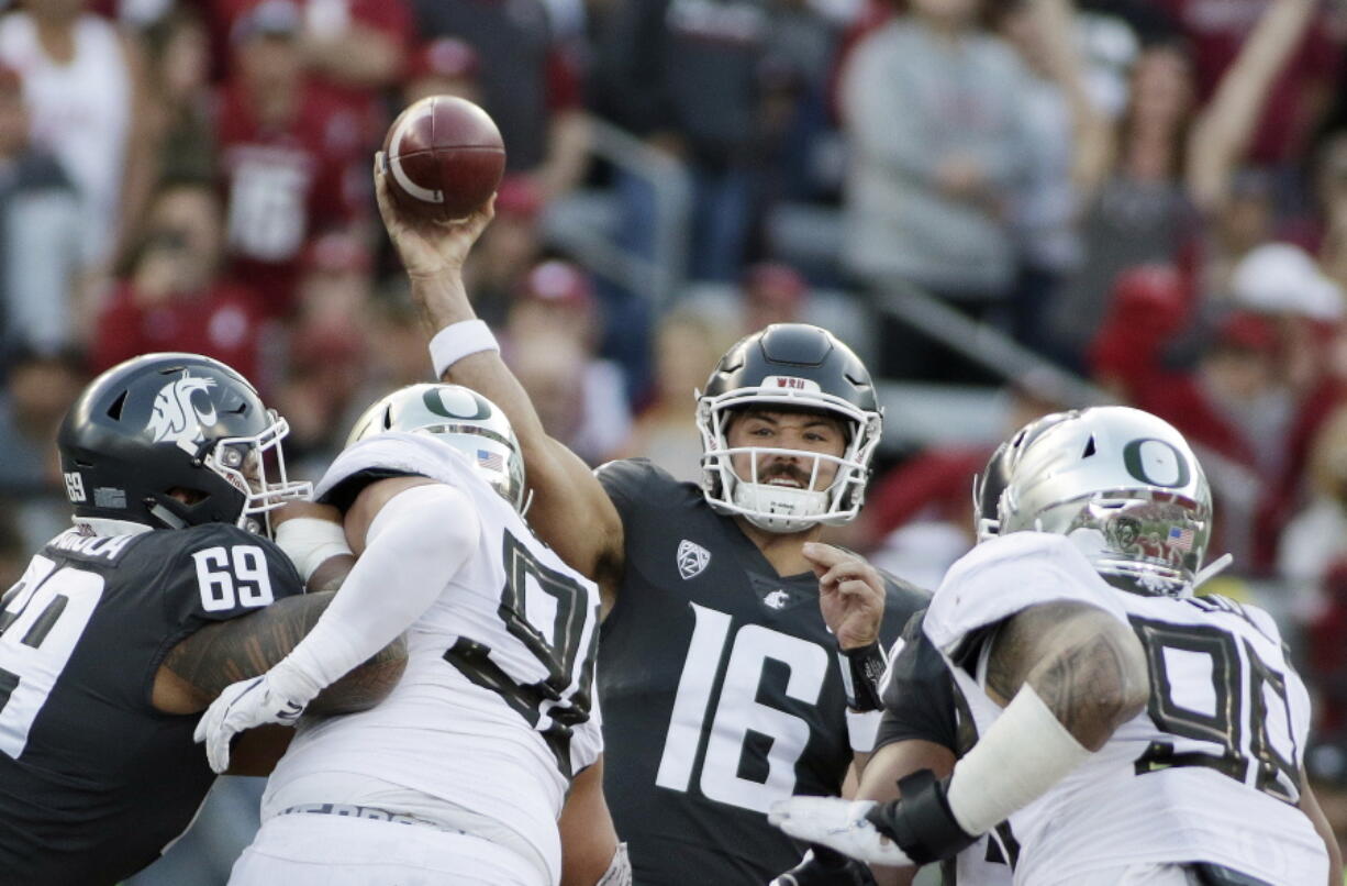 Washington State quarterback Gardner Minshew (16) throws a pass during the first half of an NCAA college football game against Oregon in Pullman, Wash., Saturday, Oct. 20, 2018.